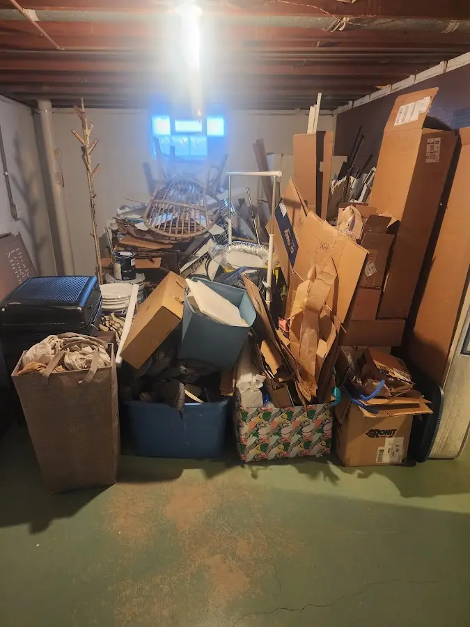 Roll-off dumpster container at job site for 6 Yard Dumpster Rental in Le Roy